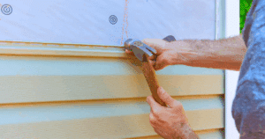 MUNZ tech working on siding replacement in Bristol, PA